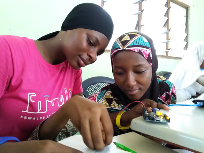 Achievers Ghana training girls in slum on how to code